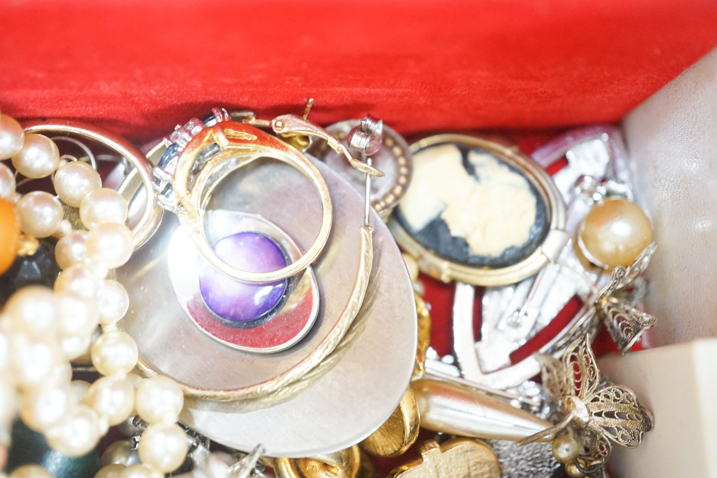 A quantity of mixed costume jewellery, including necklaces, rings etc.